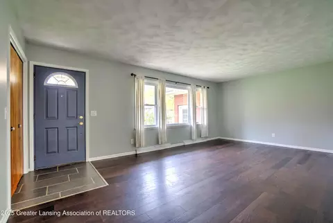 Living - 4518 Sandstone Dr, Williamston, MI 48895 photo 2 of 10