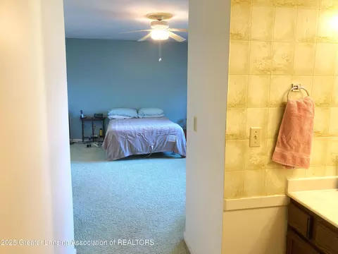 Bedroom - 912 Grenoble Dr #E, Lansing, MI 48917 photo 1 of 3