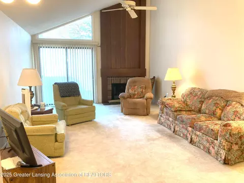 Living - 912 Grenoble Dr #E, Lansing, MI 48917 photo 2 of 2