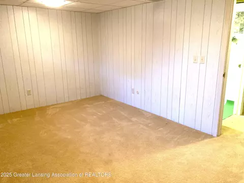 Bedroom - 912 Grenoble Dr #E, Lansing, MI 48917 photo 3 of 3