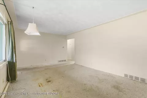 Living - 12916 Rambler Rd, Dewitt, MI 48820 photo 2 of 3