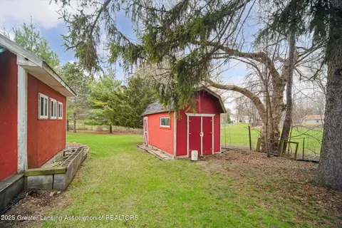 Exterior - 2711 Pine Tree Rd, Holt, MI 48842 photo 5 of 6