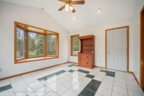Living - 2711 Pine Tree Rd, Holt, MI 48842 photo 3 of 4