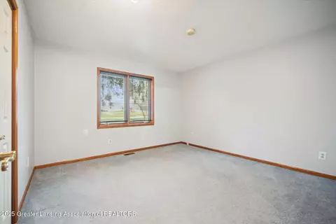 Bedroom - 2711 Pine Tree Rd, Holt, MI 48842 photo 3 of 5