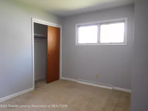 Bedroom - 231 W Rolfe St, Perry, MI 48872 photo 2 of 3