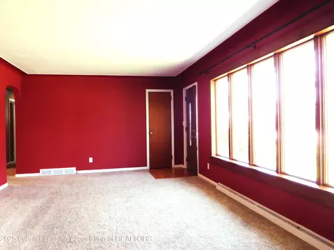 Living - 231 W Rolfe St, Perry, MI 48872 photo 2 of 4