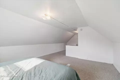 Bedroom - 916 Poxson Ave, Lansing, MI 48910 photo 5 of 6
