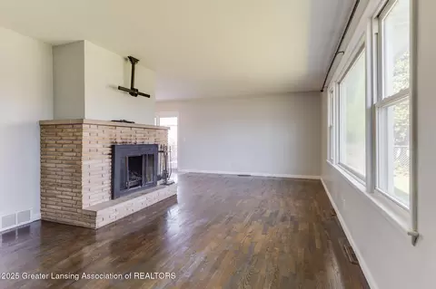 Living - 3508 Springbrook Ln, Lansing, MI 48917 photo 2 of 3