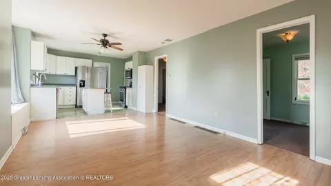 Living - 724 E Cavanaugh Rd, Lansing, MI 48910 photo 3 of 4