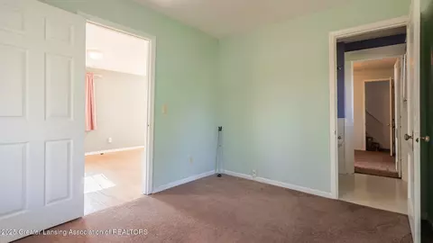 Bedroom - 724 E Cavanaugh Rd, Lansing, MI 48910 photo 1 of 6