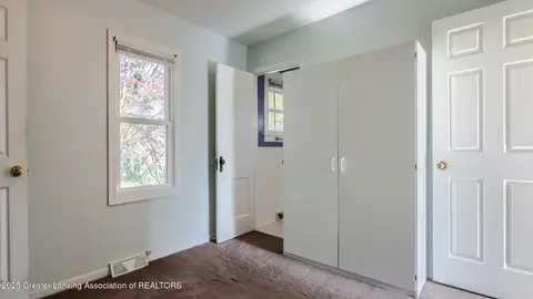 Bedroom - 724 E Cavanaugh Rd, Lansing, MI 48910 photo 3 of 6