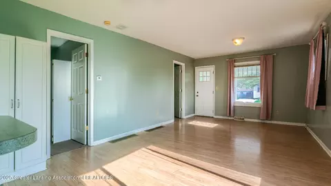 Living - 724 E Cavanaugh Rd, Lansing, MI 48910 photo 2 of 4