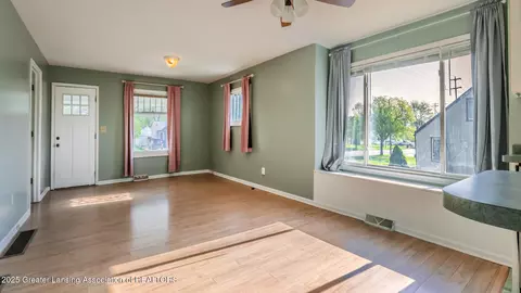 Living - 724 E Cavanaugh Rd, Lansing, MI 48910 photo 1 of 4