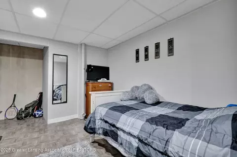 Bedroom - 910 Pecos Dr, Lansing, MI 48917 photo 8 of 12