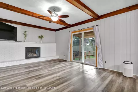 Living - 910 Pecos Dr, Lansing, MI 48917 photo 2 of 3