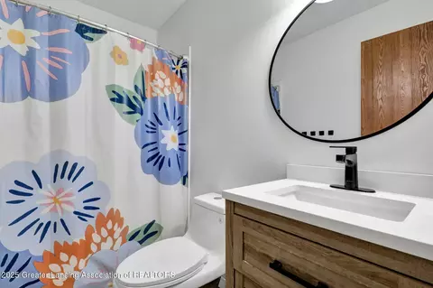 Bath - 910 Pecos Dr, Lansing, MI 48917 photo 2 of 2
