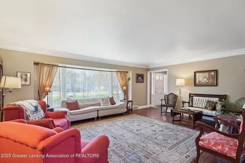 Living - 4128 Appletree Ln, Lansing, MI 48917 photo 2 of 2