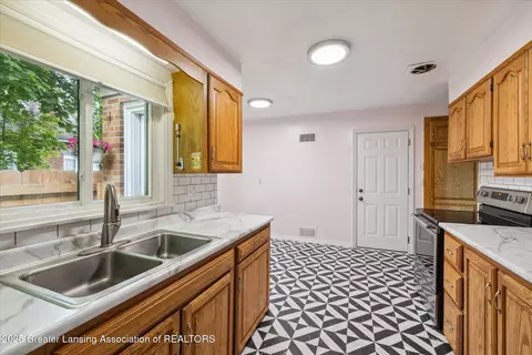 Kitchen - 428 E Miller Rd, Lansing, MI 48911 photo 1 of 5