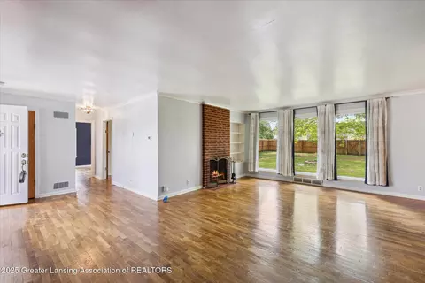 Living - 428 E Miller Rd, Lansing, MI 48911 photo 2 of 7