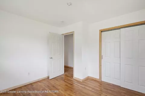 Bedroom - 127 S Dibble Ave, Lansing, MI 48917 photo 2 of 3