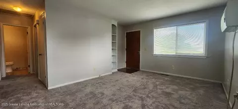 Living - 6622 Aurelius Rd, Lansing, MI 48911 photo 1 of 2
