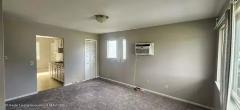 Living - 6622 Aurelius Rd, Lansing, MI 48911 photo 2 of 2