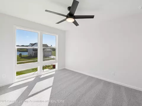 Bedroom - 606 Launch Point Dr, Perry, MI 48872 photo 2 of 6