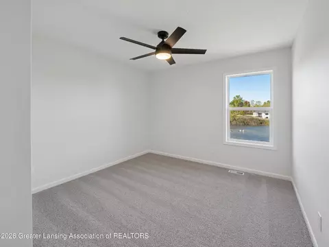 Bedroom - 606 Launch Point Dr, Perry, MI 48872 photo 6 of 6
