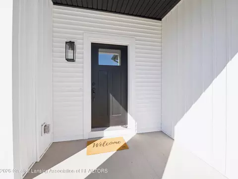 Exterior - 606 Launch Point Dr, Perry, MI 48872 photo 6 of 10