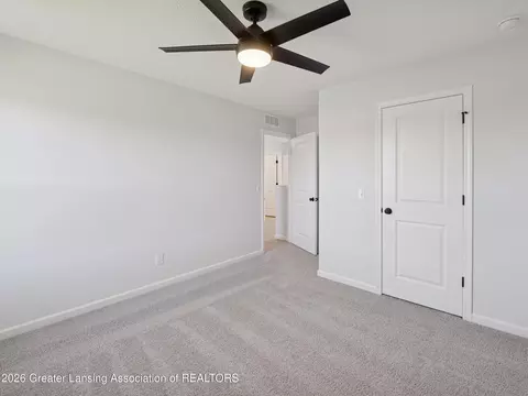 Bedroom - 606 Launch Point Dr, Perry, MI 48872 photo 1 of 6