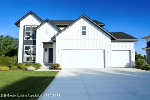 Exterior - 606 Launch Point Dr, Perry, MI 48872 photo 2 of 10