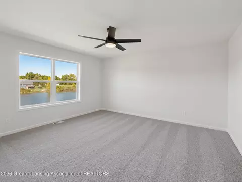 Bedroom - 606 Launch Point Dr, Perry, MI 48872 photo 5 of 6