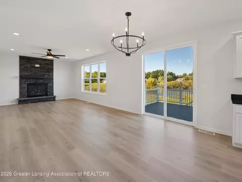 Living - 606 Launch Point Dr, Perry, MI 48872 photo 3 of 4