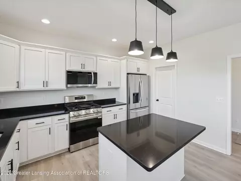 Kitchen - 606 Launch Point Dr, Perry, MI 48872 photo 3 of 3