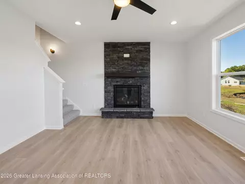 Living - 606 Launch Point Dr, Perry, MI 48872 photo 2 of 4