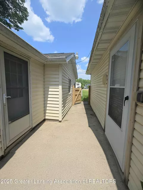 Exterior - 6574 Sawmill Rd, Harrison, MI 48625 photo 1 of 2