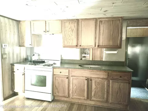 Kitchen - 6574 Sawmill Rd, Harrison, MI 48625 photo 2 of 3