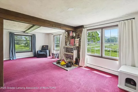 Living - 820 Barry Rd, Haslett, MI 48840 photo 2 of 3