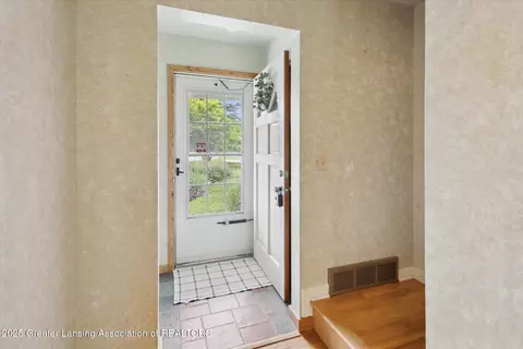 Entry Way - 718 Hogsback Rd, Mason, MI 48854 photo 1 of 2