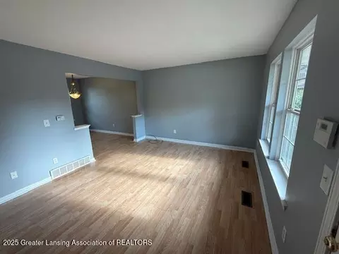 Living - 6328 Beechfield Dr, Lansing, MI 48911 photo 1 of 4
