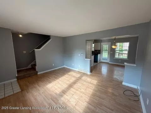 Living - 6328 Beechfield Dr, Lansing, MI 48911 photo 2 of 4