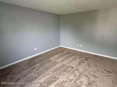 Living - 6328 Beechfield Dr, Lansing, MI 48911 photo 4 of 4