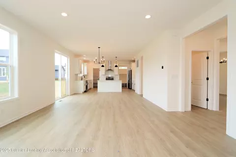 Living - 612 Titanium Trl, Haslett, MI 48840 photo 3 of 4