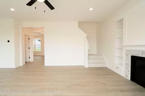 Living - 612 Titanium Trl, Haslett, MI 48840 photo 2 of 4
