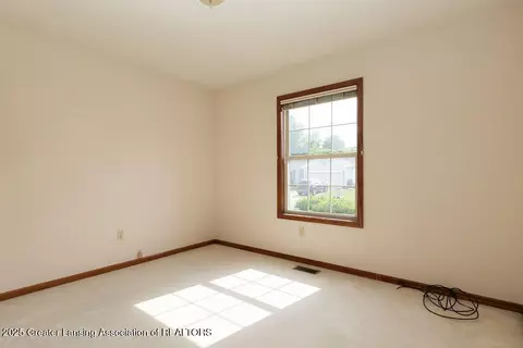 Bedroom - 13900 Gk Drive Dr, Bath, MI 48808 photo 4 of 4