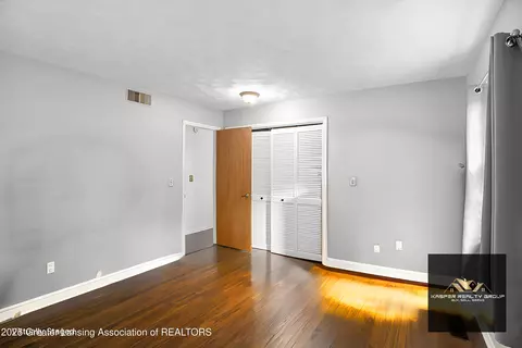 Bedroom - 1614 N Eifert Rd, Holt, MI 48842 photo 4 of 10