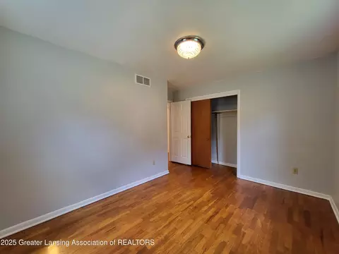 Bedroom - 6910 Cooper Rd, Lansing, MI 48911 photo 3 of 5