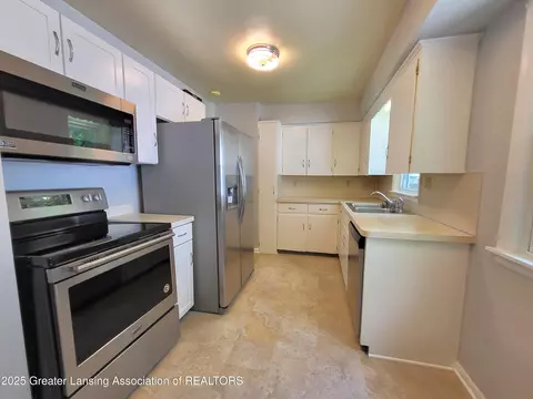 Kitchen - 6910 Cooper Rd, Lansing, MI 48911 photo 2 of 2