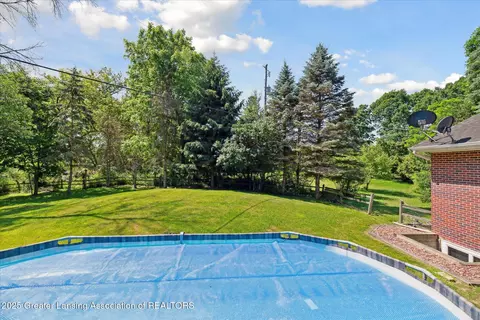 Exterior - 4084 Hulett Rd, Okemos, MI 48864 photo 10 of 13