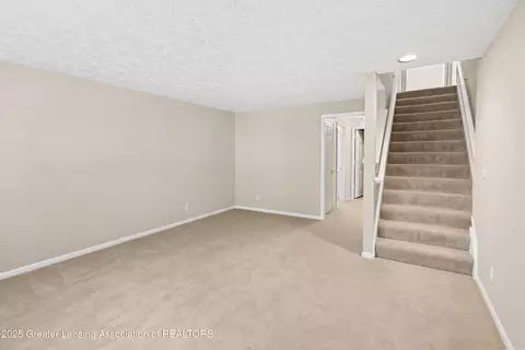 Living - 4163 Hamlet Cv, Bath, MI 48808 photo 9 of 12